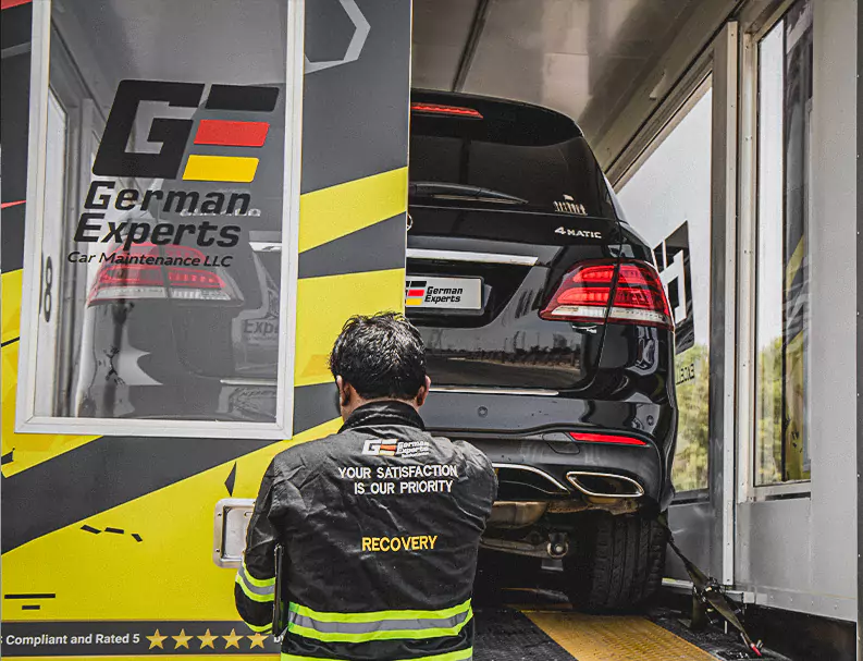 A German Expert Recovering the Car on Van