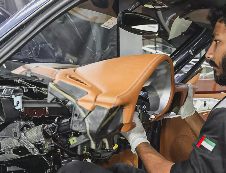 A German Expert trying to Fix Car Dashboard leather